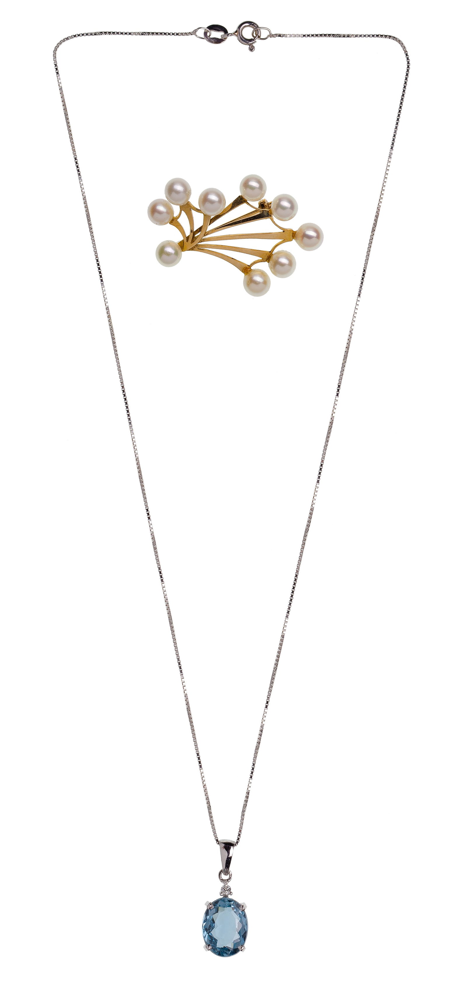 18k Gold Jewelry: 18k Gold Jewelry (2) items including a blue topaz and diamond pendant necklace and an approximately 5mm pearl fan shaped pin having original presentation box (both marked '18k') Property from: an Esta