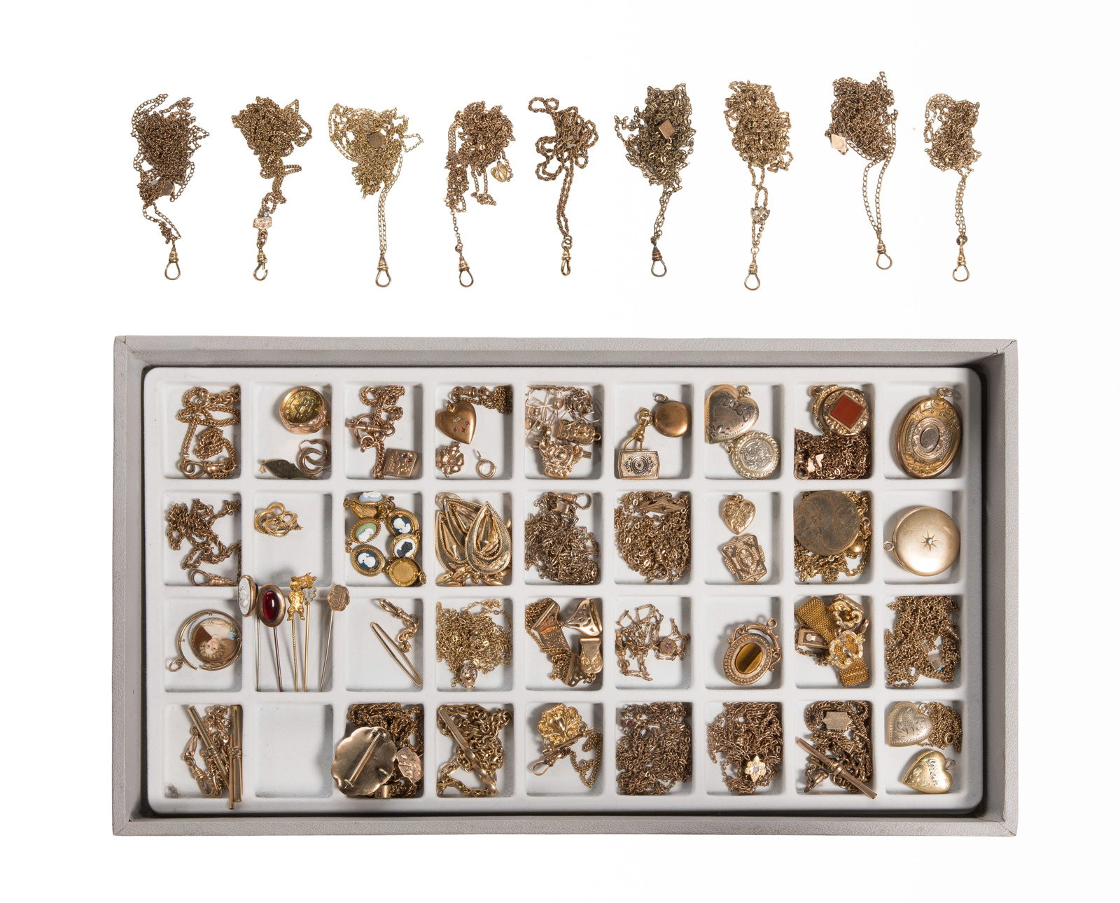Victorian Era Jewelry Assortment: Victorian Era Jewelry Assortment Including a variety of charms, lockets, chains, hair pins, pins and rings, some gold-filled Property from: a Private Collector, Evanston, Illinois Length: 24 inches