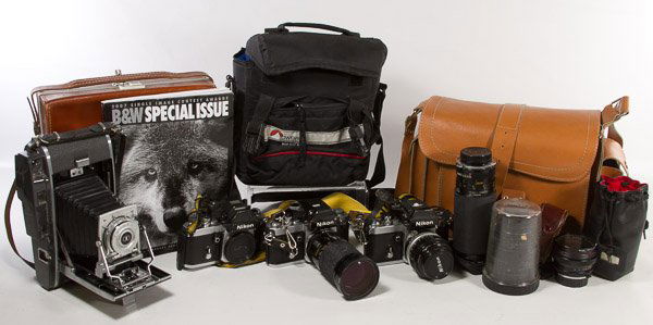 Camera Assortment: Camera Assortment Including three Nikon F2 cameras, a Keenko Skylight 62mm lense, a Nikon Teleconverter TC-2, a GE Exposure Meter Type DW-68, a Hoya 67mm lense, another Kenko Skylight (1A) 62mm lense