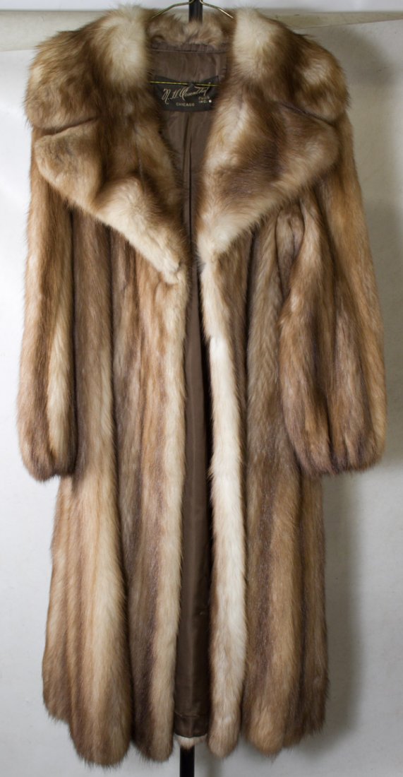 Mink Coat from N.V. Rosenthal Furs: Mink Coat from N.V. Rosenthal Furs Having beige fur with dark brown highlights and taupe satin lining Length: 50.00 inches, Width: 22.00 inches (width from arm pit to arm pit)Size: Medium Category: Cl