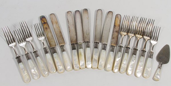 Landers, Frary & Clark Pearl Handled Flatware: Landers, Frary & Clark Pearl Handled Flatware Including (8) knifes, (6) forks and (3) salad forks together with a cheese knife Length: 8.75 inches (knife) Category: Silver > Other Shipping Status: Leo