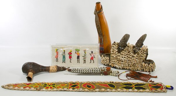 African Decorative Arts Assortment: African Decorative Arts Assortment Including a gourd bottle with leather beaded strap, a red and black beaded wall hanging, a hand engraved dagger in shell sheath, a Jamaican embroidered napkin set, a