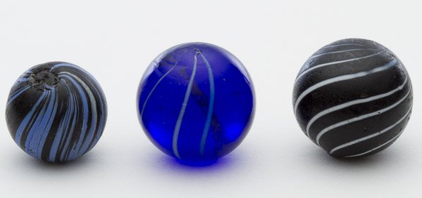 Clambroth Marbles: Clambroth Marbles Including two black and one blue marble Diameter: 0.68 inches (largest) Category: Collectibles > Marbles Shipping Status: Leonard Auction, Inc. will directly ship via USPS Approximat