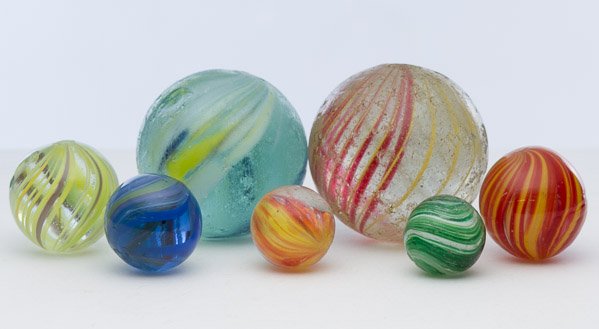 Swirl Marble Assortment: Swirl Marble Assortment Seven marbles including coreless swirl Diameter: 1.45 inches (largest) Category: Collectibles > Marbles Shipping Status: Leonard Auction, Inc. will directly ship via USPS Appro