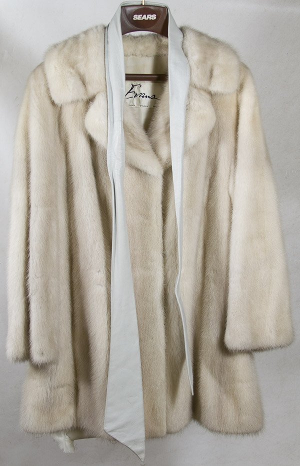 White Mink Jacket by Evans: White Mink Jacket by Evans Having leather belt Length: 33.00 inches, Width: 15.00 inches (shoulders) Category: Clothing & Accessories > Coats Shipping Status: Leonard Auction, Inc. will directly ship