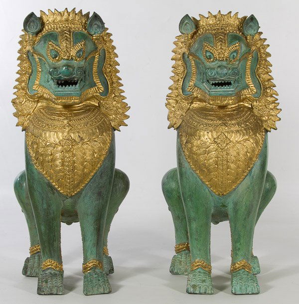 Cast Metal Dragon Fu Dog Statues: Cast Metal Dragon Fu Dog Statues Two statues having gold gilt mane, bib and anklets Height: 15.50 inches, Width: 6.50 inches, Depth: 7.50 inches Category: Decorative Arts > Asian Tax Status: Subject t