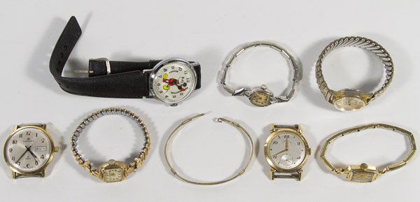 Wrist Watch Assortment: Wrist Watch Assortment Seven watches including Bucherer, Elgin, Waltham and a Mickey Mouse example Category: Jewelry and Timepieces > Men's Wrist Watches Shipping Status: Leonard Auction, Inc. will di