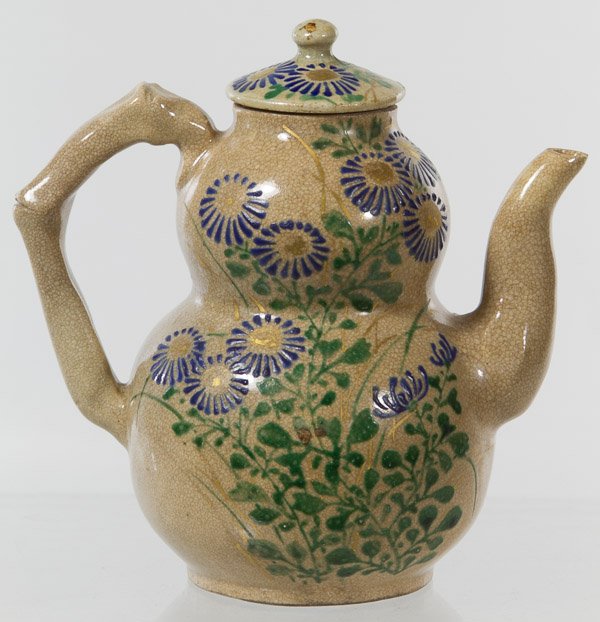 Kyoto Pottery Wine Pot: Kyoto Pottery Wine Pot 19th Century; having a gosu blue chrysanthemum design on a double gourd-form body; makers mark on base; Provenance: Eldred's Auction, August 19, 2008, lot #369 Height: 5.00 inch
