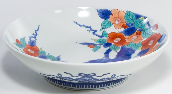 Nabeshima Porcelain Dish: Nabeshima Porcelain Dish c.1920 (Taisho period); having a colorful plum tree interior design; Provenance: Eldred's Auction, August 22, 2000, lot #116 Height: 2.25 inches, Width: 8.25 inches Category: