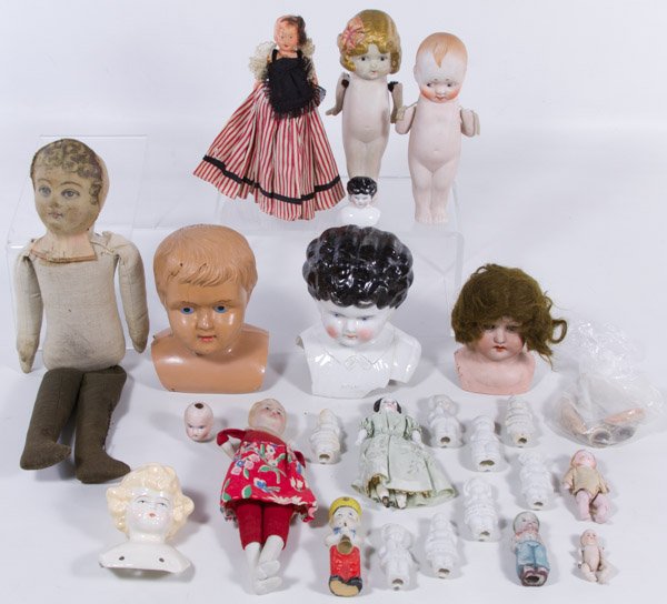 Antique Doll Assortment: Antique Doll Assortment Including a Heubach 275 bisque shoulder head, four china shoulder heads, a cloth mask face, two celluloid dolls, two all bisque dollhouse dolls and Japanese bisque novelty doll