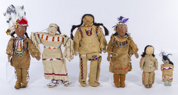 Plains Indian and Iroquois Doll Assortment: Plains Indian and Iroquois Doll Assortment Including five dolls with leather faces and one with a corn husk face, and all have beaded leather clothes Height: 12.00 inches (tallest) Category: Toys and