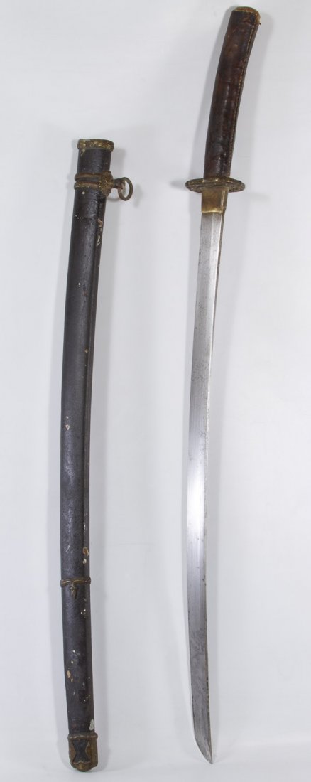 World War II Japanese Katana Sword: World War II Japanese Katana Sword Having a leather wrapped handle and sheath Length: 26.50 inches (blade) Category: Military & Weapons > World War II Shipping Status: Leonard Auction, Inc. will direc