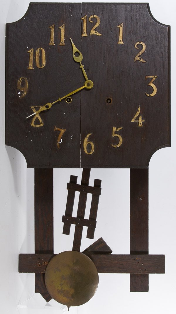 Mission Oak Wall Clock: Mission Oak Wall Clock Wall clock having metal numbers Height: 26.00 inches, Width: 13.00 inches, Depth: 4.75 inches Category: Decorative Arts > Clocks Shipping Status: 3rd Party Shipping; the shippin