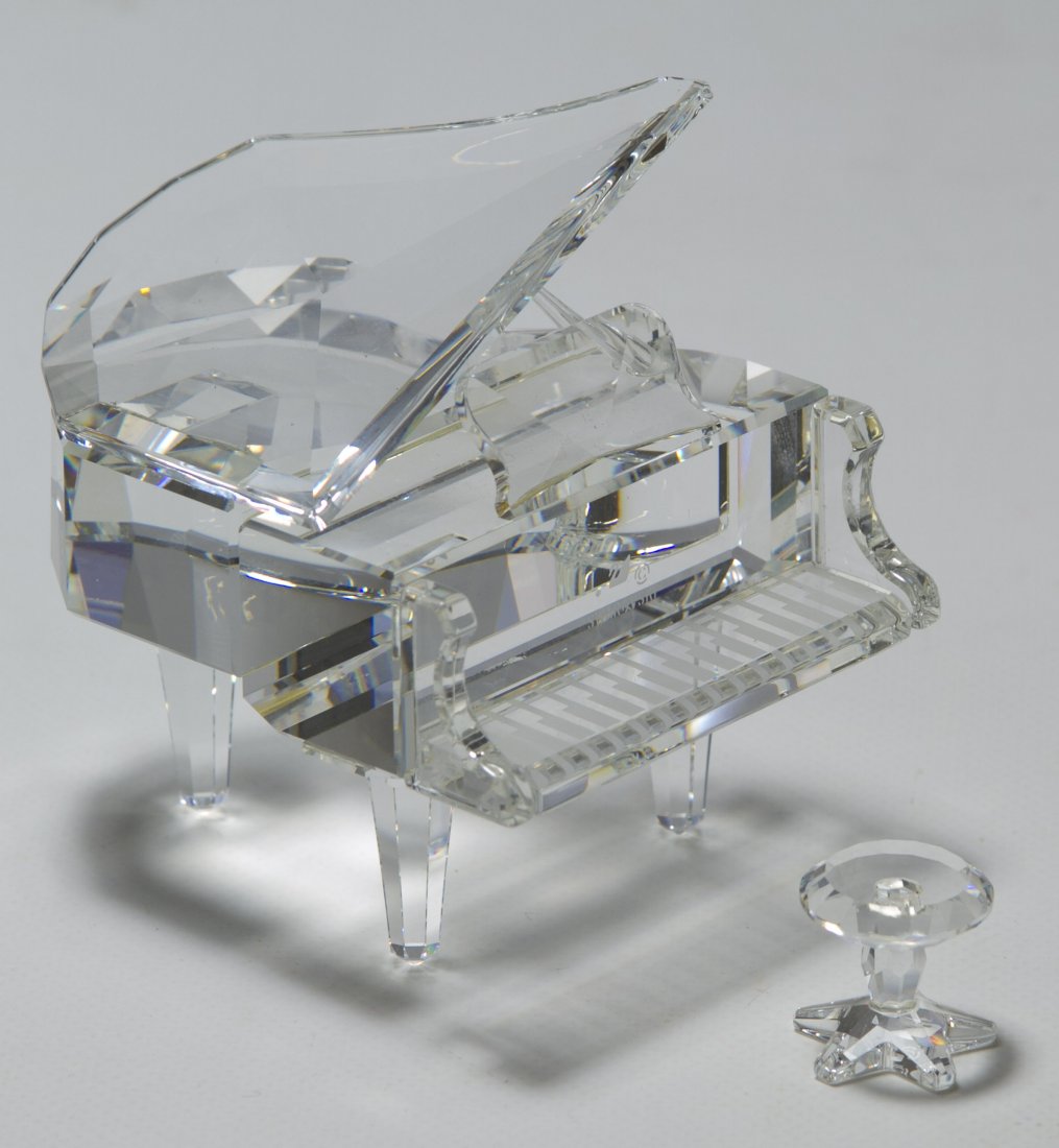 Swarovski Crystal 'Piano and Stool' Figurine: Swarovski Crystal 'Piano and Stool' Figurine Height: 4.75 inches (box) Category: Crystal > Swarovski Shipping Status: Leonard Auction, Inc. will directly ship via USPS