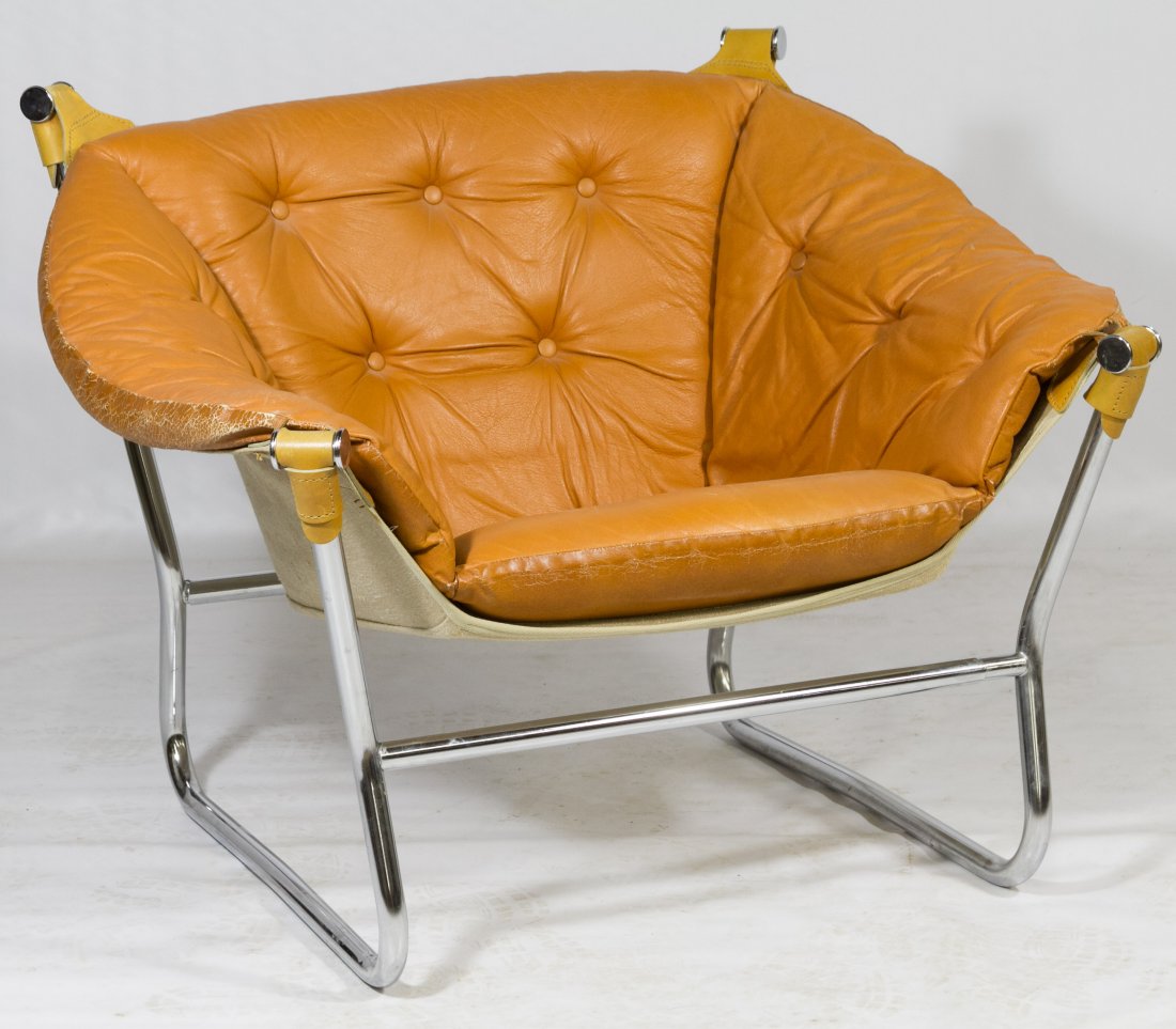 Chrome and Leather Club Chair: Chrome and Leather Club Chair Leather cushion insert fits into heavy burlap support on chrome legs and back Height: 28.00 inches, Width: 36.00 inches, Depth: 27.00 inches Category: Furniture > Mid-Cen