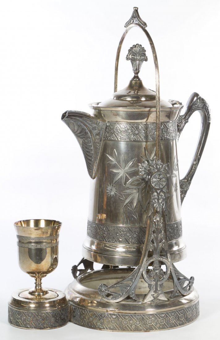 Southington Cutlery Co. Silverplate Tilting Water: Southington Cutlery Co. Silverplate Tilting Water Server with Goblet c.1875, having a triple silverplate tilting, insulated water pitcher with hinged lid and attached base for separate goblet Height: 