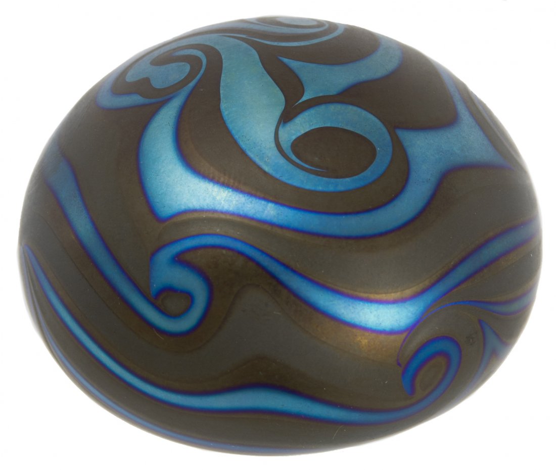 Charles Lotton Paperweight: Charles Lotton Paperweight 1980, Dark black glass decorated paperweight with an iridescent blue King Tut pattern, signed 'Charles Lotton' and dated Height: 1.75 inches, Diameter: 2.75 inches Category: