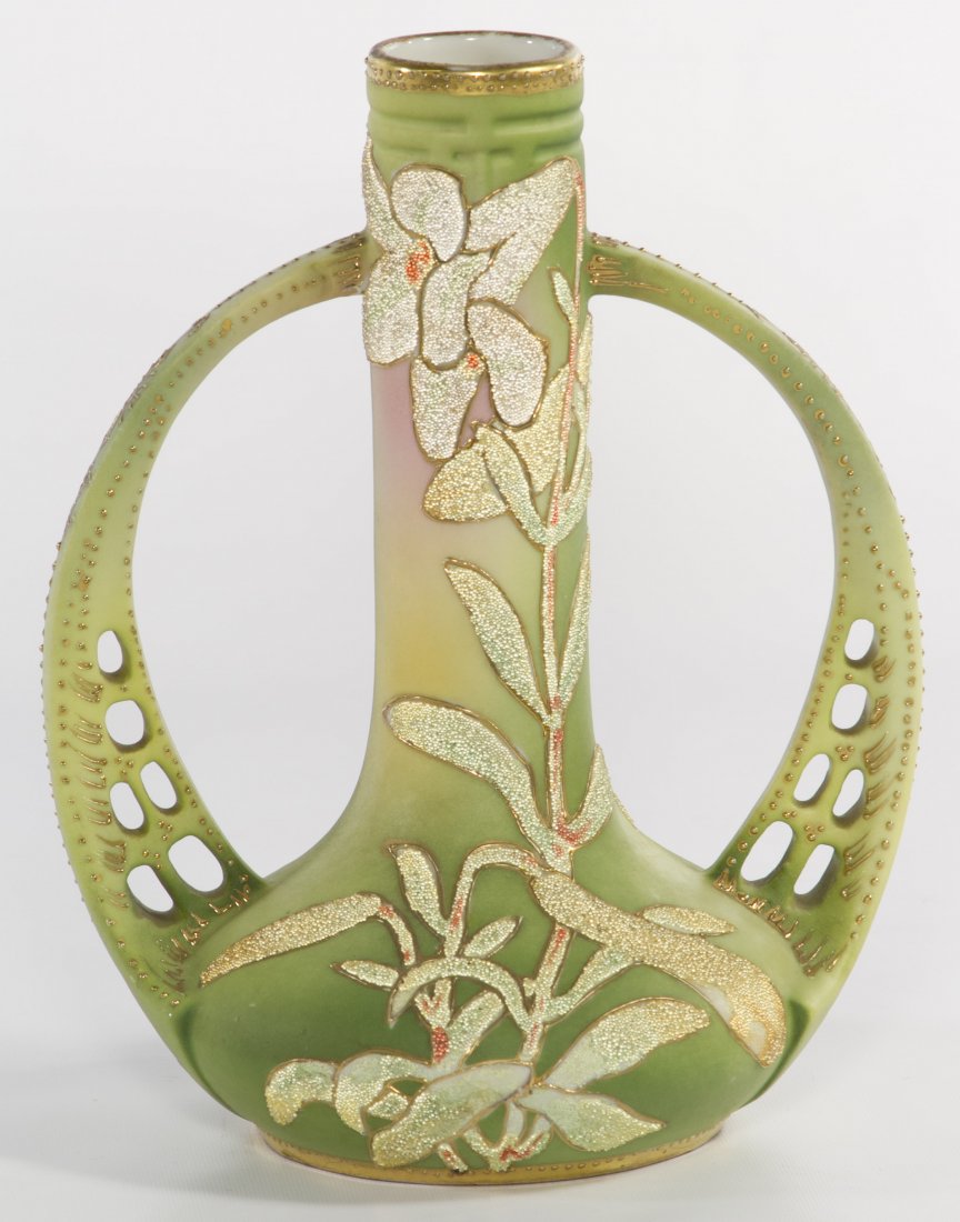 Nippon Coralene Vase: Nippon Coralene Vase c.1909, having a light green glaze with applied seed beads, two pierced handles with applied gilt decoration and stamped patented mark Height: 8.75 inches Category: Porcelain and 