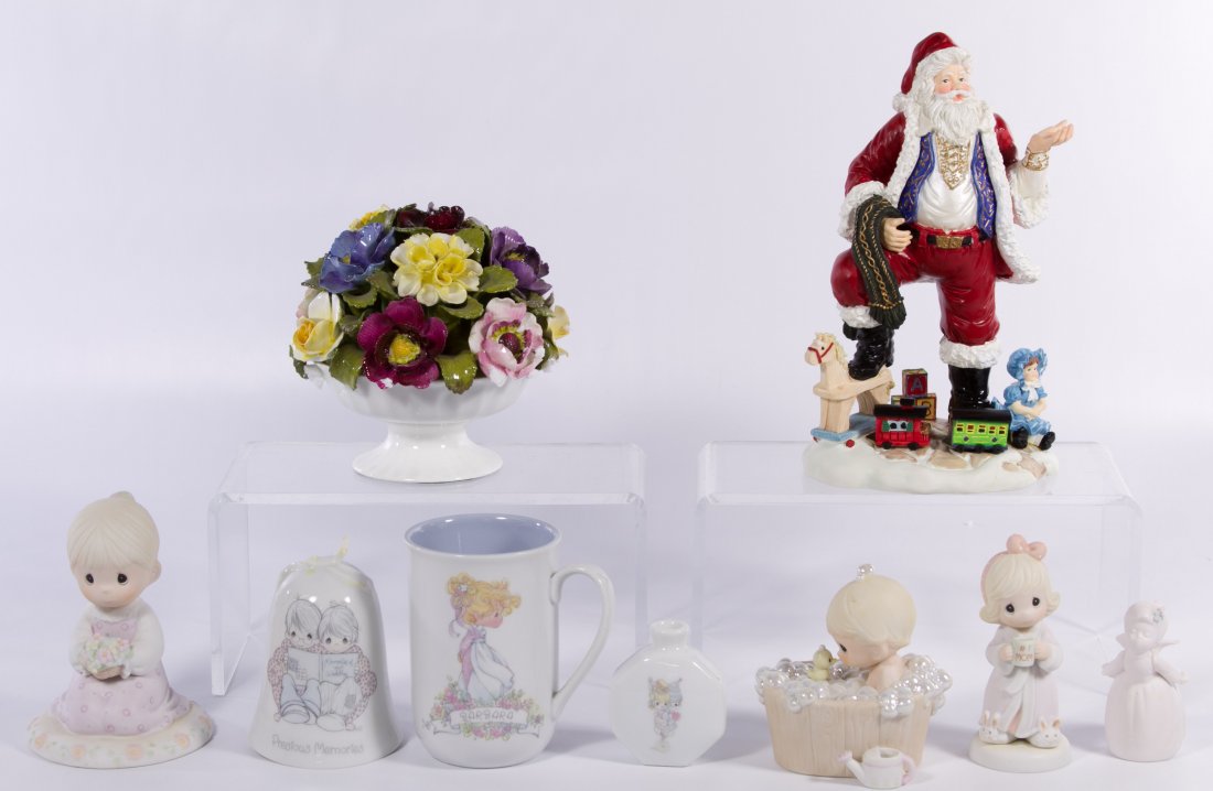 Porcelain Figurine Assortment: Porcelain Figurine Assortment Nine items including a St. Nick figurine, a floral bouquet and Precious Moments items Height: 10.50 inches (St. Nick box) Category: Figurines > Other Shipping Status: 3rd