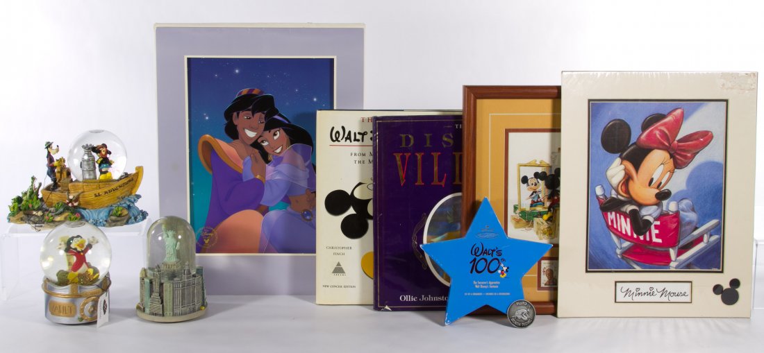 Disney Snow Globes, Books and Print Assortment: Disney Snow Globes, Books and Print Assortment Nine items including two Disney snow globes, a 'New York, New York' snow globe, three prints, two books and a set of ornaments Height: 16.00 inches (Disn