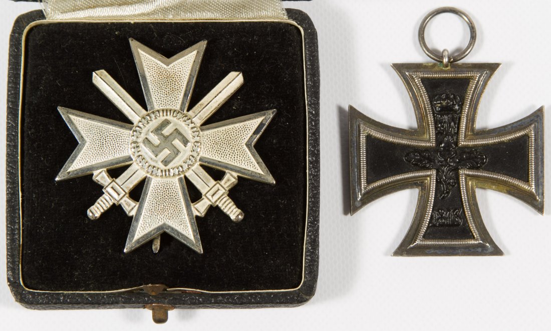 World War I and II German Medals: World War I and II German Medals Including an iron cross and a war merit cross with box Length: 3.00 inches (box) Category: Military & Weapons > World War I Shipping Status: Leonard Auction, Inc. will