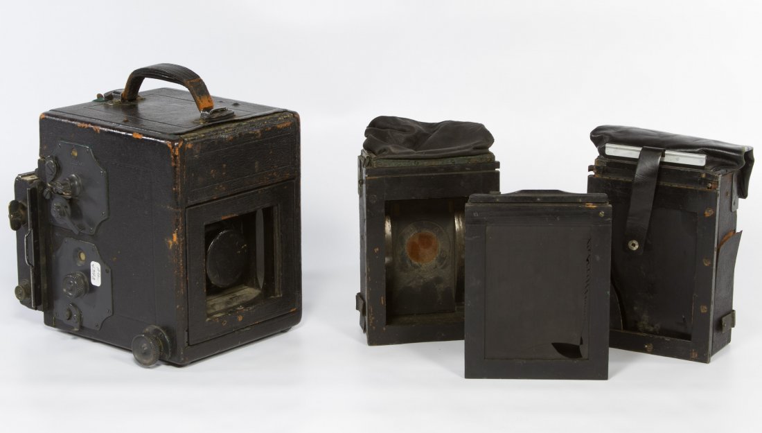 Eastman Auto Graflex Camera: Eastman Auto Graflex Camera Bausch & Lomb lens #322216; together with three accessories Height: 7.00 inches, Depth: 17.00 inches (camera) Category: Cameras and Electronics > Cameras Shipping Status: L