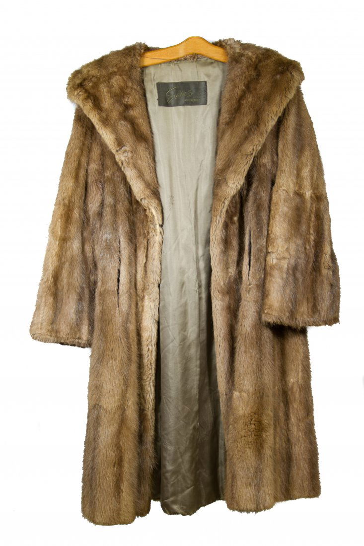 Mink Coat by Evans: Mink Coat by Evans Medium brown Length: 41.00 inches, Width: 21.00 inches (back below ther arms) Category: Clothing & Accessories > Coats Tax Status: Subject to an 8.25% sales tax for Illinois residen