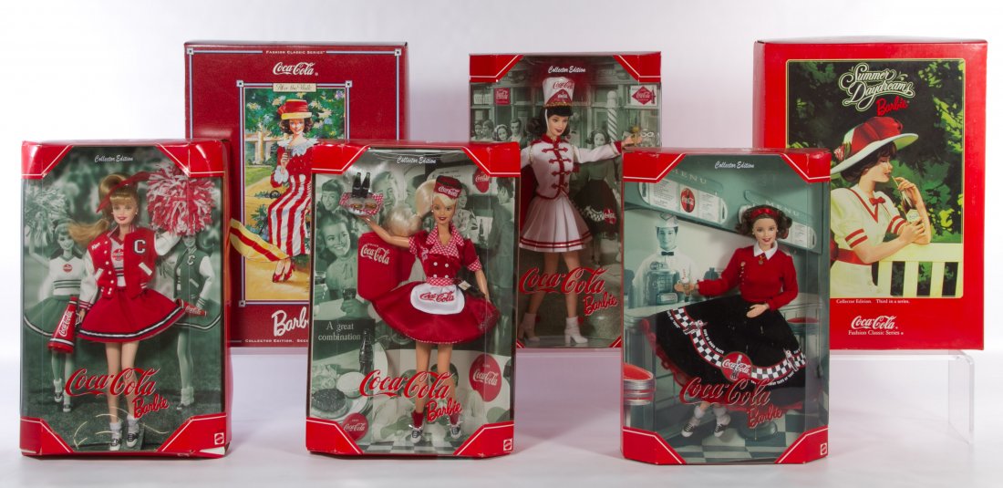 Coca-Cola Barbie Assortment: Coca-Cola Barbie Assortment Six boxed dolls including 'After the Walk,' 'Summer Daydreams,' and Coca Cola Barbie dolls #28376, #53974, #24637 and #22831 Height: 14.00 inches (tallest box) Category: To