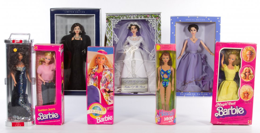 Elizabeth Taylor, Givenchy and Travel Barbie Doll: Elizabeth Taylor, Givenchy and Travel Barbie Doll Assortment Eight boxed dolls including Elizabeth Taylor in the film 'Father of the Bride' Height: 14.00 inches (tallest box) Category: Toys and Dolls 