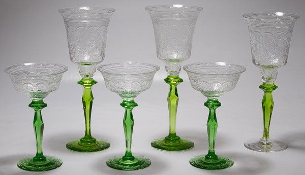 Pairpoint Green Stem Goblets: Pairpoint Green Stem Goblets Six goblets with light green faceted stems and molded hanging garland bowls including five with green garland bases and one with a clear base Height: 10.00 inches (tallest