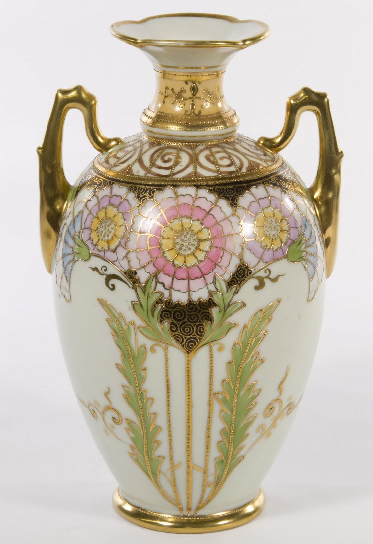 Morimura Nippon Porcelain Vase: Morimura Nippon Porcelain Vase Having two handles with Art Nouveau style flowers decorated with moriage and gilt; the underside marked with a green wreath Height: 10.00 inches Category: Porcelain and 