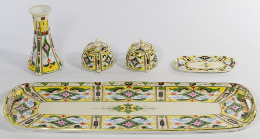 Noritake Porcelain Dresser Set: Noritake Porcelain Dresser Set Including two trays, a vase and two covered jars having the 'Noritake (Maruki symbol) Made in Japan' mark in blue Length: 17.75 inches Category: Porcelain and Ceramics >
