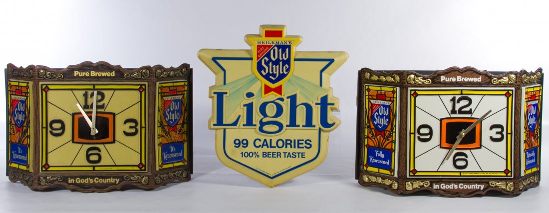 Old Style Beer Lighted Clocks and Sign: Old Style Beer Lighted Clocks and Sign Three items including two Old Style clock beer signs from 1978 and an Old Style Light beer sign from 1980 Height: 12.00 inches, Width: 17.00 inches Category: Mar