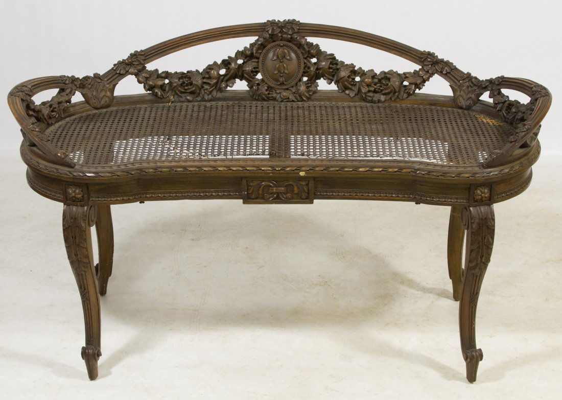 American Carved Mahogany and Caned Bench: American Carved Mahogany and Caned Bench Having floral swags on the back rest Height: 24.50 inches, Width: 42.00 inches, Depth: 19.00 inches Category: Furniture > American Shipping Status: 3rd Party S