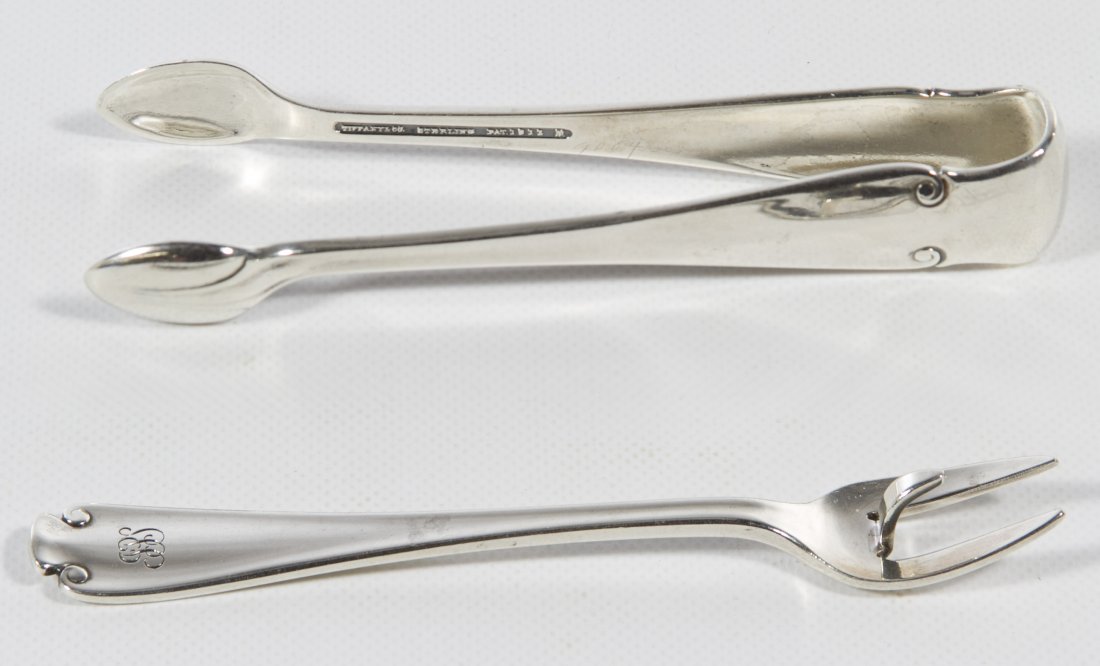 Tiffany & Co. Sterling Silver Sugar Tongs and Lemon: Tiffany & Co. Sterling Silver Sugar Tongs and Lemon Fork Weight: 1.67 ozt. Category: Silver > Sterling Silver Flatware Shipping Status: Leonard Auction, Inc. will directly ship via USPS Approximate Sa