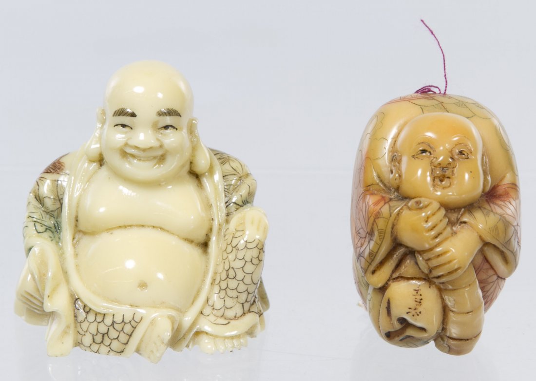 Netsukes: Netsukes Two items including a male figure carved from a taqua nut and a Buddha figure carved from resin Height: 2.00 inches (tallest) Category: Decorative Arts > Asian Shipping Status: Leonard Auctio