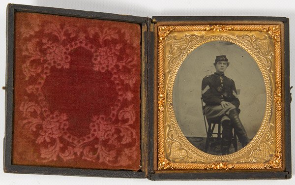 Civil War Armed Union Soldier Ruby Red Ambrotype: Civil War Armed Union Soldier Ruby Red Ambrotype Photograph 1/6 plate, depicting a soldier wearing a 71st New York Kepi Width: 3.25 inches (case) Category: Books & Ephemera > Photographs Shipping Stat