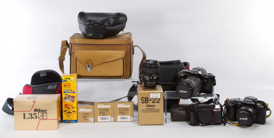 Nikon Cameras and Lens Assortment: Nikon Cameras and Lens Assortment Including a Nikon Decision Master System N4004s and one Nikon Decision Master System AF N4004; one AF Micro Nikkor 60mm 1:2.8D lens, one AF Nikkor 35070mm 1:3.3-4.5 l