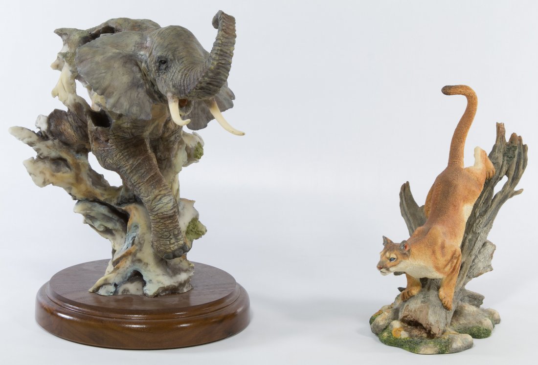 Elephant and Cat Statues: Elephant and Cat Statues Two items including a 'Carefree' elephant statue by Mill Creek Studios and a Danbury Mint 'Silent Pursuit' wild cat statue by Nick Bibby Height: 12.00 inches Category: Decorat