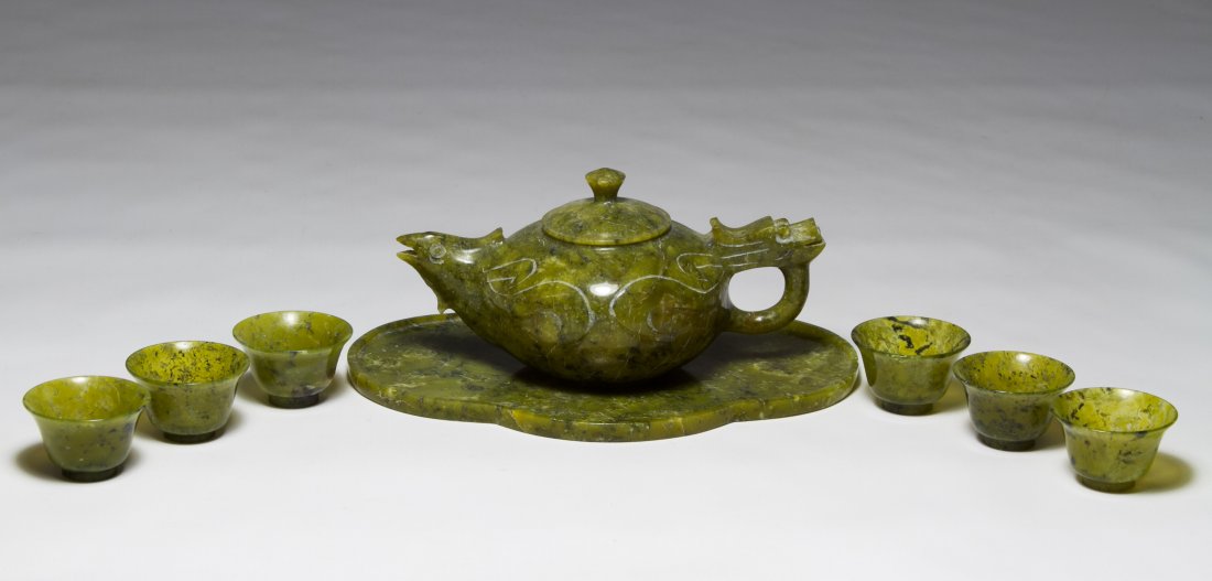 Jadeite Miniature Tea Set: Jadeite Miniature Tea Set 20th Century, includes tray, teapot and six cups Width: 6.75 inches (tray) Category: Decorative Arts > Asian Shipping Status: Leonard Auction, Inc. will directly ship via USP