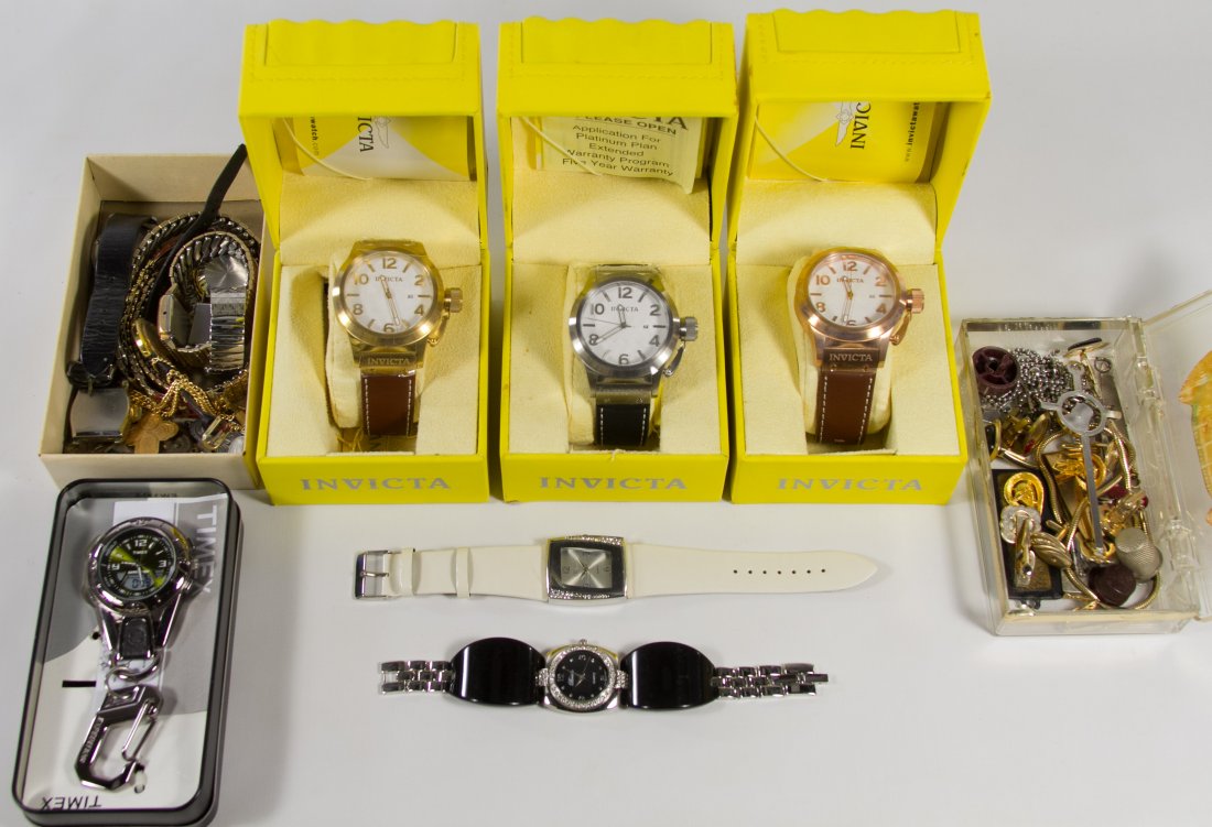 Men's Invicta Wrist Watches: Men's Invicta Wrist Watches Three watches; two watches have brown leather bands and one has a black leather band; includes original boxes; together with a assortment of costume jewelry; one sterling c