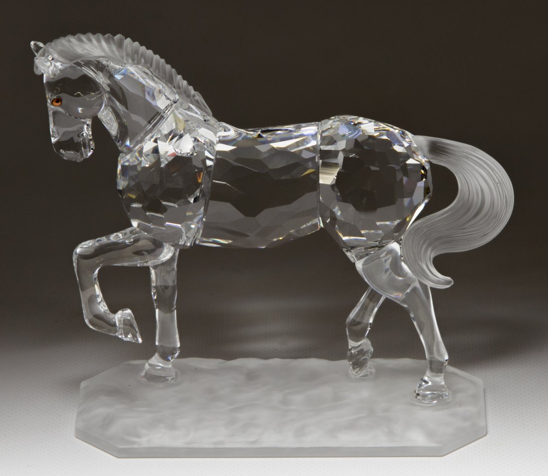 Swarovski Crystal 'Arabian Stallion' Figurine: Swarovski Crystal 'Arabian Stallion' Figurine Having the original box with #A7612NR000002 on decal label Height: 3.75 inches Category: Crystal > Swarovski Shipping Status: Leonard Auction, Inc. will d
