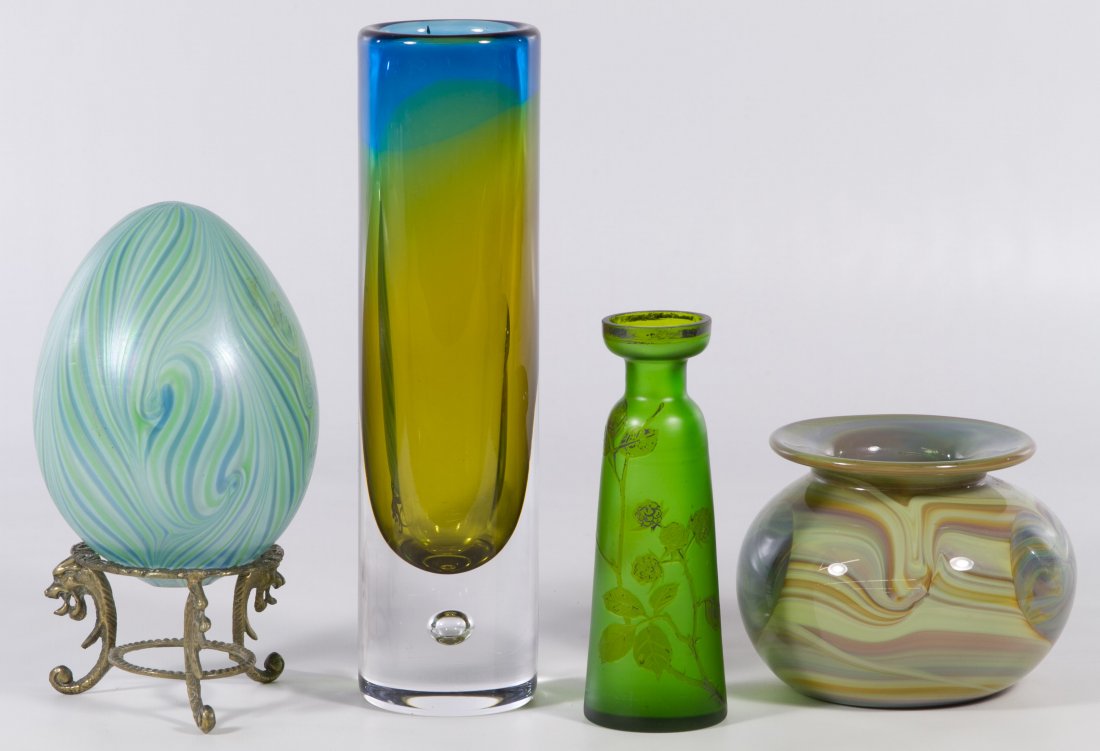 Kosta Art Glass Vase: Kosta Art Glass Vase Numbered 441889, signed on the underside; together with a 1973 Zweifel iridescent glass vase, a Vandermark glass egg with stand and a green glass vase with a floral motif Height: 
