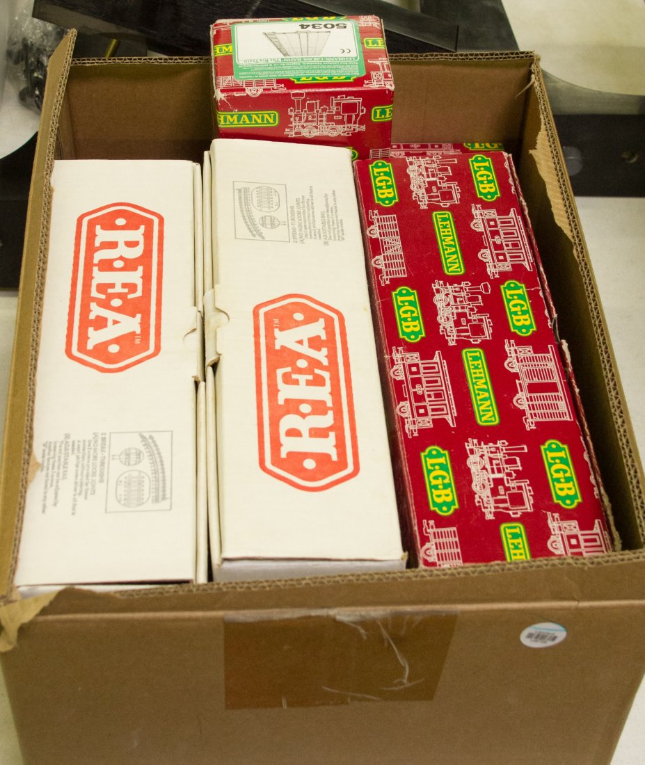 LGB and REA G Scale Tracks: LGB and REA G Scale Tracks Two REA-11000 straight track 300mm, (4) LGB 1100 600mm, a 1015K 150mm track, a 5034 platform. All accessories in original boxes Category: Toys and Dolls > Post-War Trains Sh