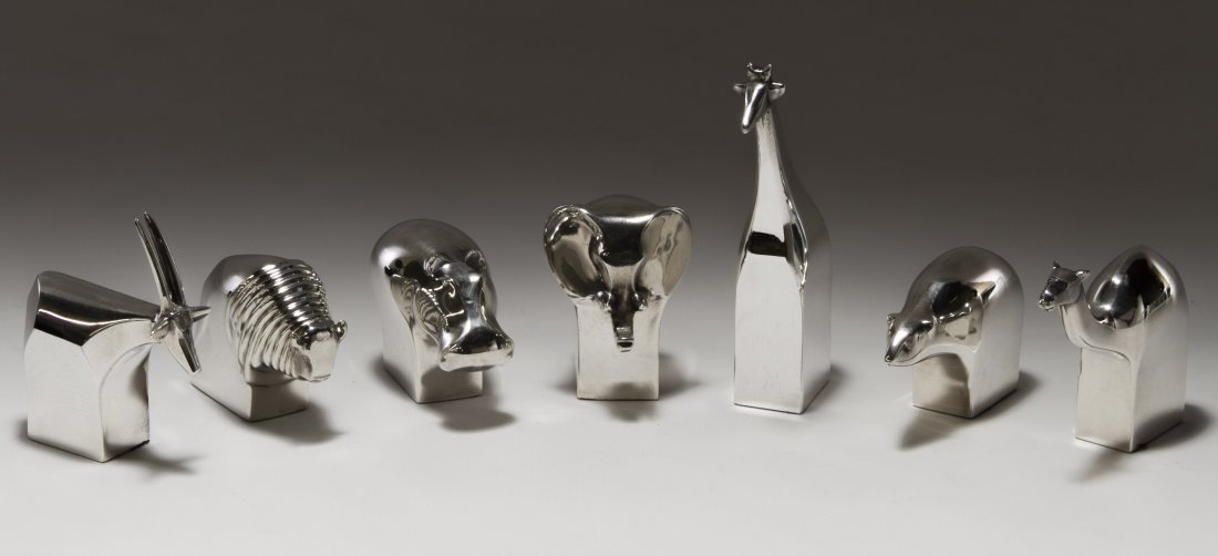 Dansk Silverplate Animal Figurines: Dansk Silverplate Animal Figurines Seven pieces including an elephant, a giraffe, a bison, a polar bear, an antelope, a hippopotamus and a camel Height: 1.75 inches (bison) Category: Figurines > Other