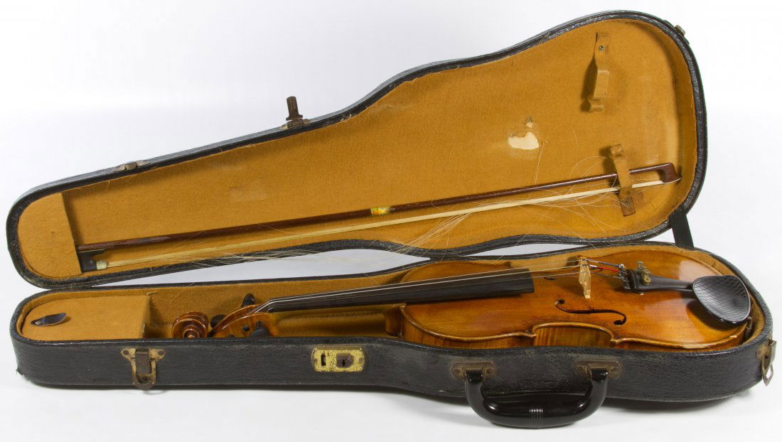 Mittenwald German Violin: Mittenwald German Violin Having a two piece back, chin rest, bow, Lifton case and a label inside the violin that reads 'Made expressly for / William Lewis & Sons / Chicago Illinois in / Mittenwald Ger
