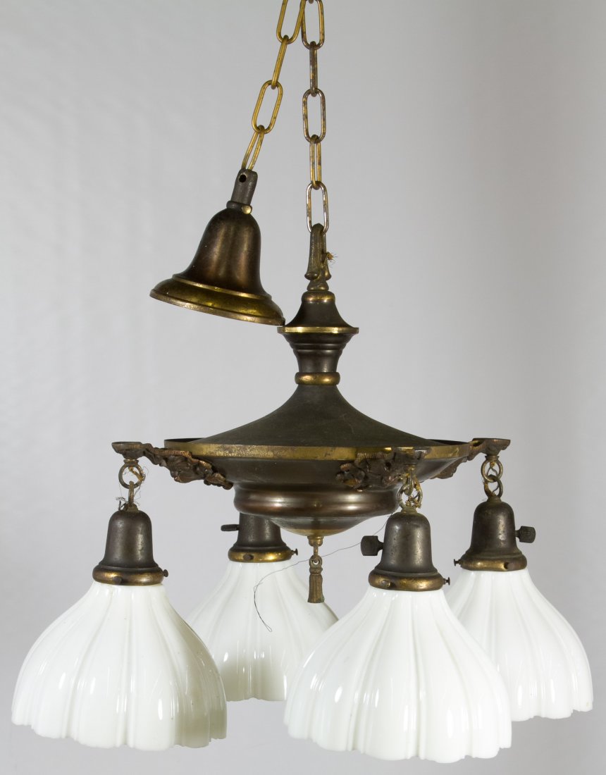 Hanging Light Fixture: Hanging Light Fixture Brass chandelier with milk glass shades Diameter: 21.50 inches Category: Decorative Arts > Lamps Shipping Status: 3rd Party Shipping; the shipping cost may be high; please contac