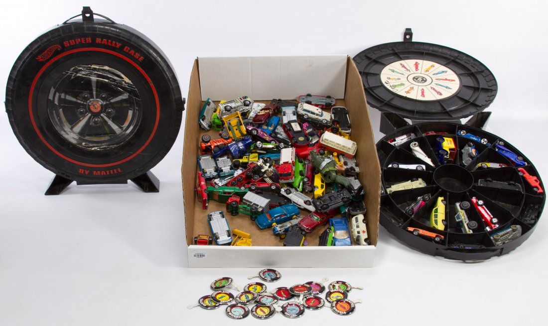 Mattel 'Hot Wheels' and Lesney 'Matchbox' Car: Mattel 'Hot Wheels' and Lesney 'Matchbox' Car Assortment Including eighty one cars, two Mattel 'Super Rally' cases and Hot Wheels metal buttons Diameter: 13.00 inches (case) Category: Toys and Dolls >