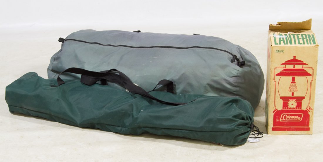 Camping Equipment Assortment: Camping Equipment Assortment Including a Gander Mountain 14'x7', 3-room tent that sleeps eight, a cot and a Coleman lantern Width: 168.00 inches, Depth: 84.00 inches Category: Sporting Goods > Other S