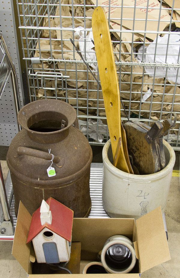 Primitive Kitchen Assortment: Primitive Kitchen Assortment Eighteen items including leather and wood bellows, three sock / stocking stretchers, a cast iron corn muffin pan, two copper gingerbread man molds, two iron utensils, a st